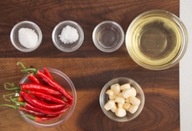 Prepare ingredients and finely chop garlic into minced garlic.