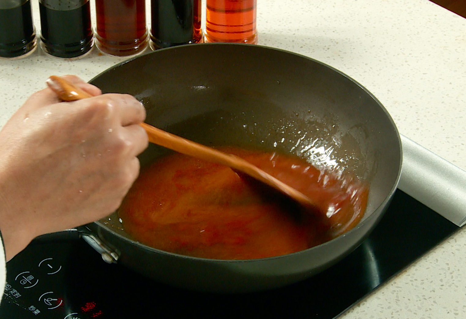 Recipe to make Sweet and Sour Sauce: Combine vinegar, tomato sauce, and sugar in pan with oil, stir-fry until melted.