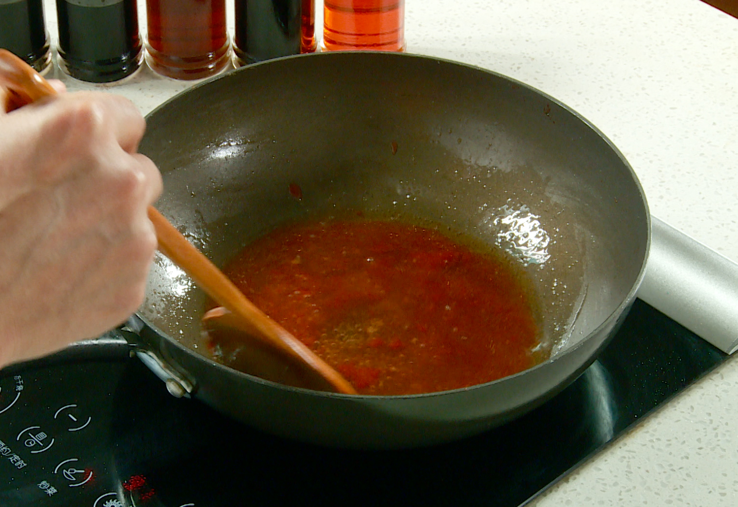 Make a tangy sauce with sugar, vinegar, and ketchup.