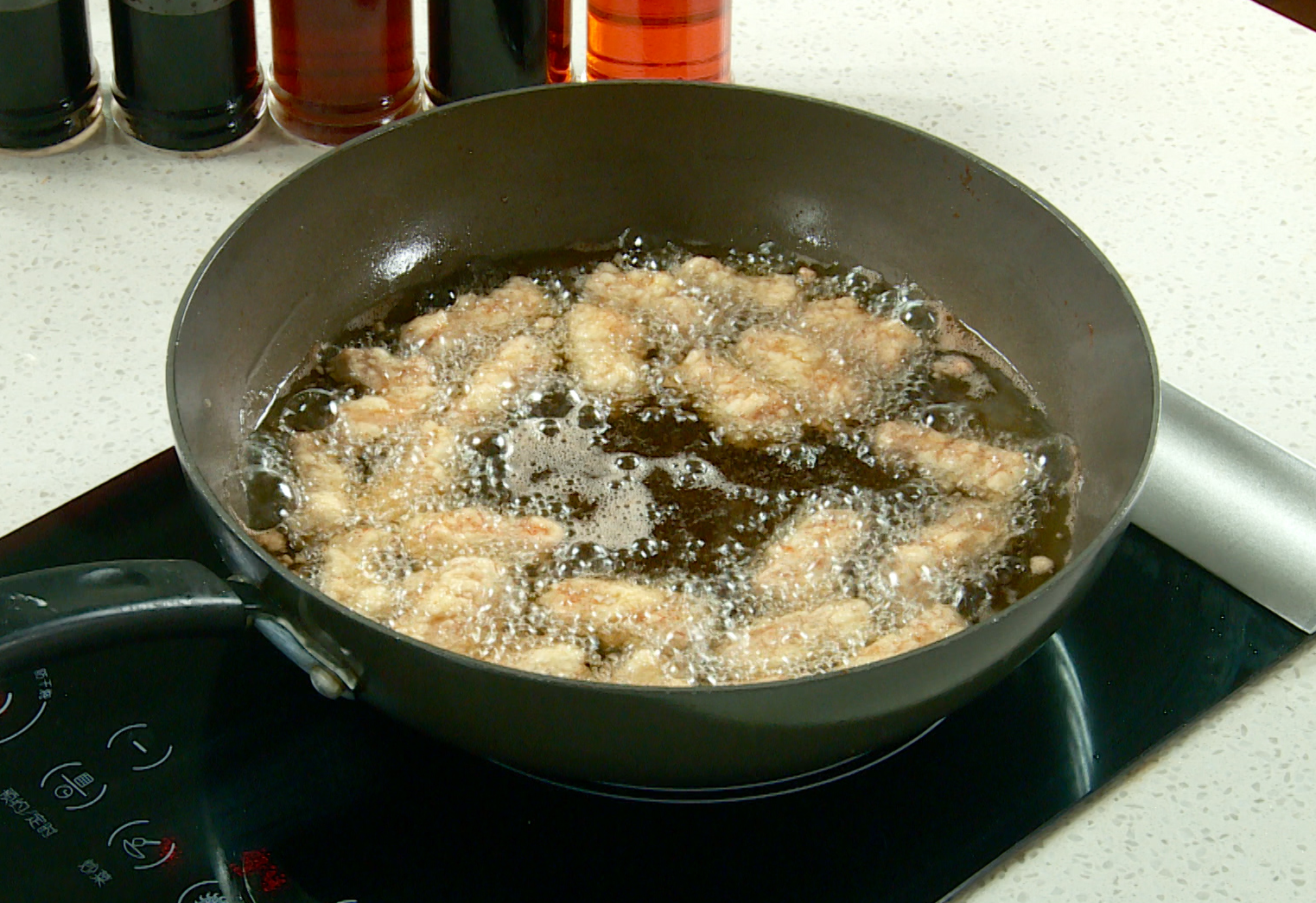 Fry pork tenderloin strips in hot oil until golden brown.