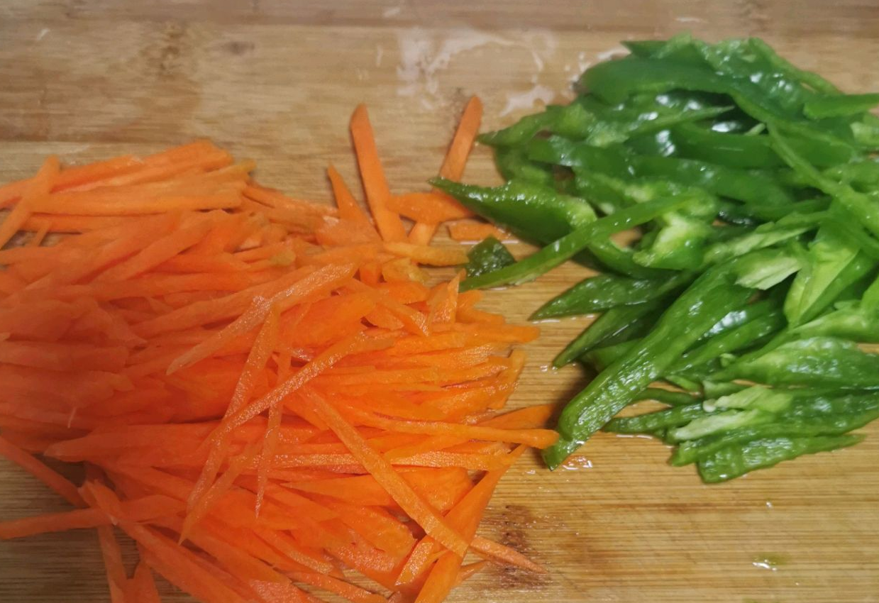 Julienne carrot and bell pepper.