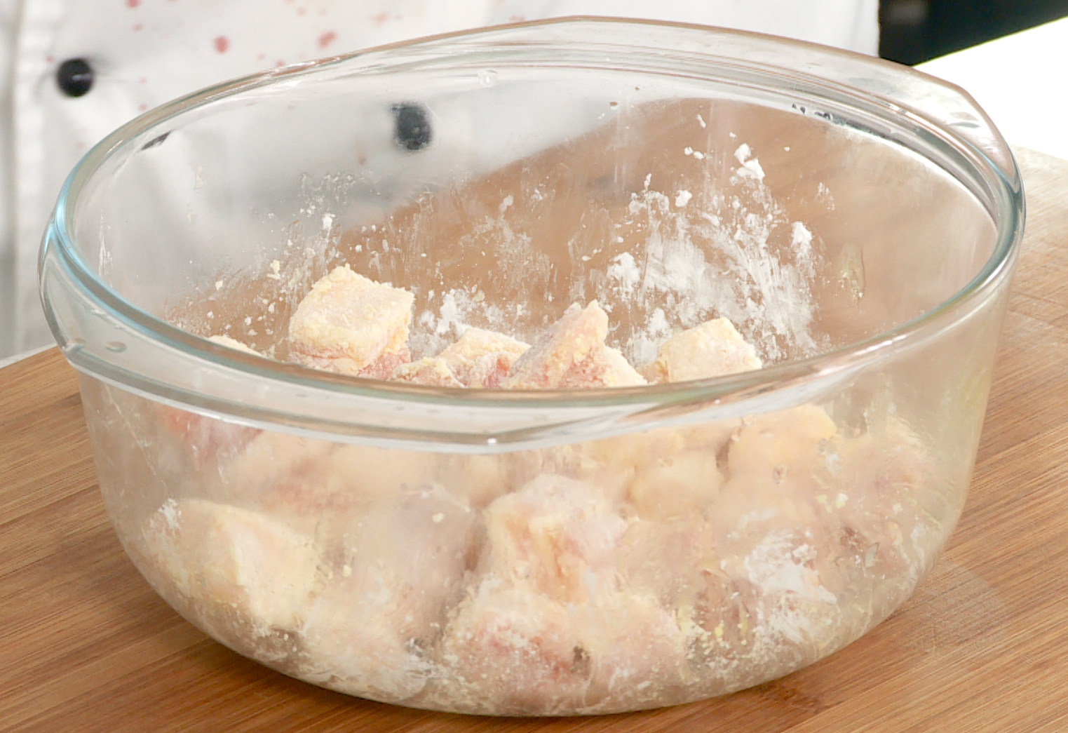 Marinate pork cubes for crispy texture: salt, egg yolk, cornstarch.