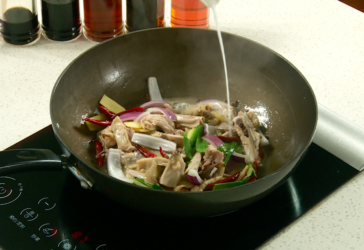 Stir-fry vegetables, thicken sauce with cornstarch slurry. Use prepared mixture for ease.