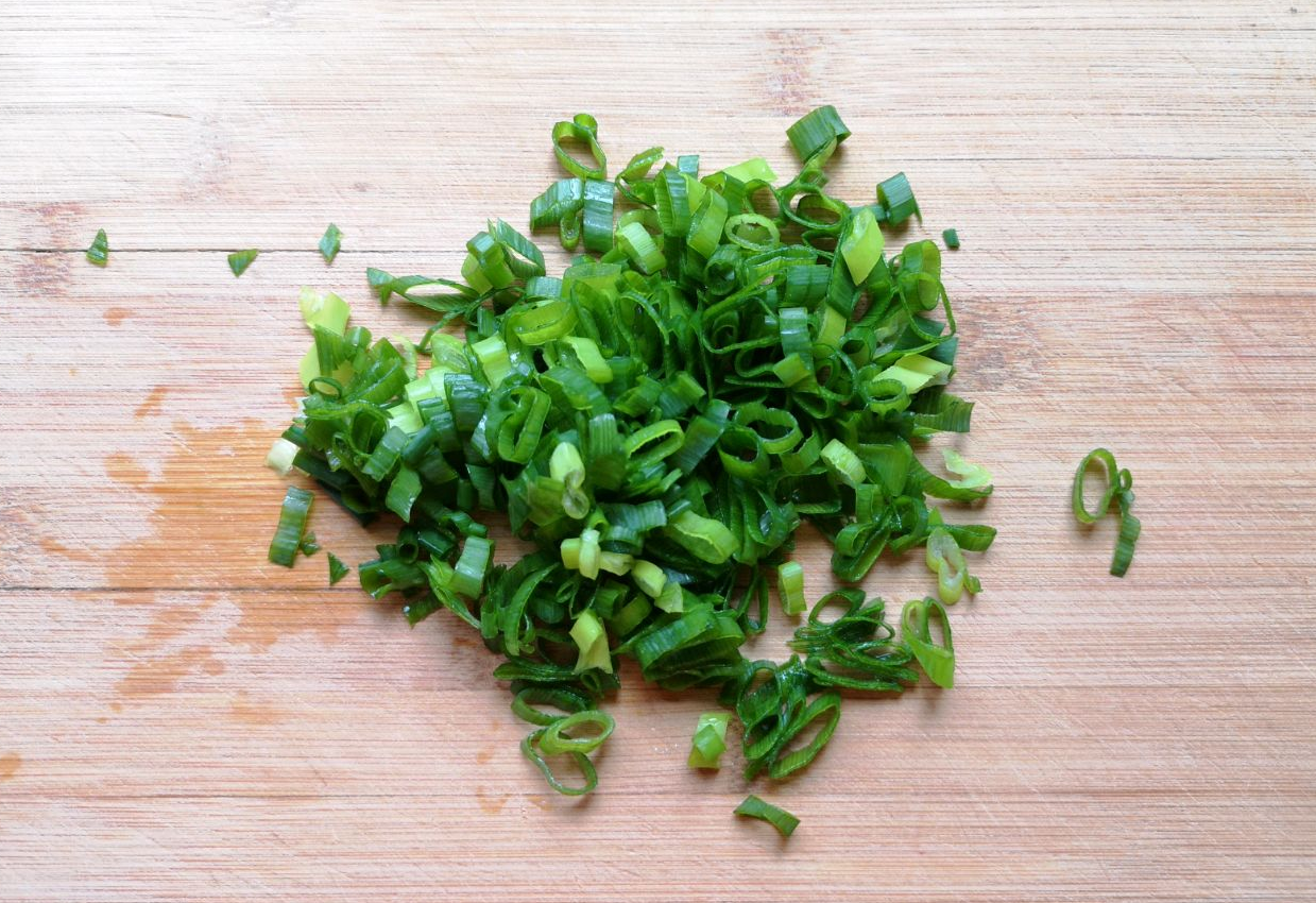 Chop green spring onion for later use as scallions.