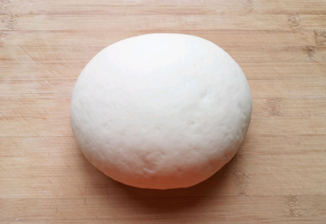 Knead well-fermented dough until smooth; deflate excess air.