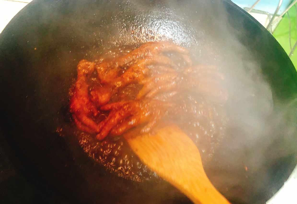 Simmer sauce until thick; garnish with green onions before serving.