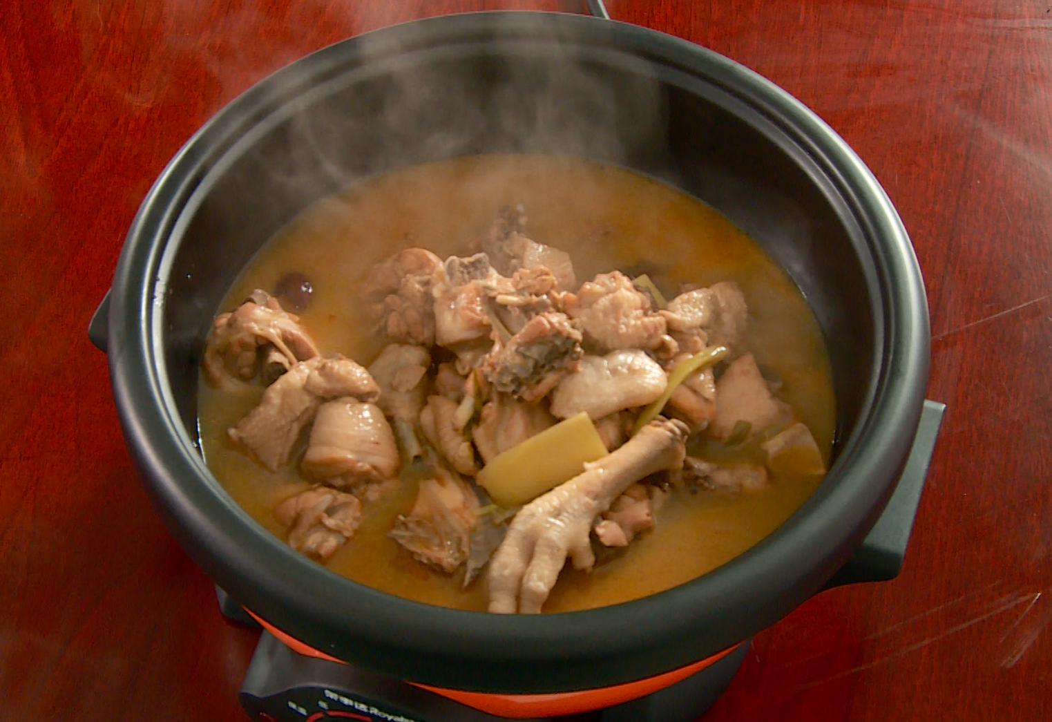 Season and serve by adding salt, stirring, removing the spice bag, and pouring broth into pot.