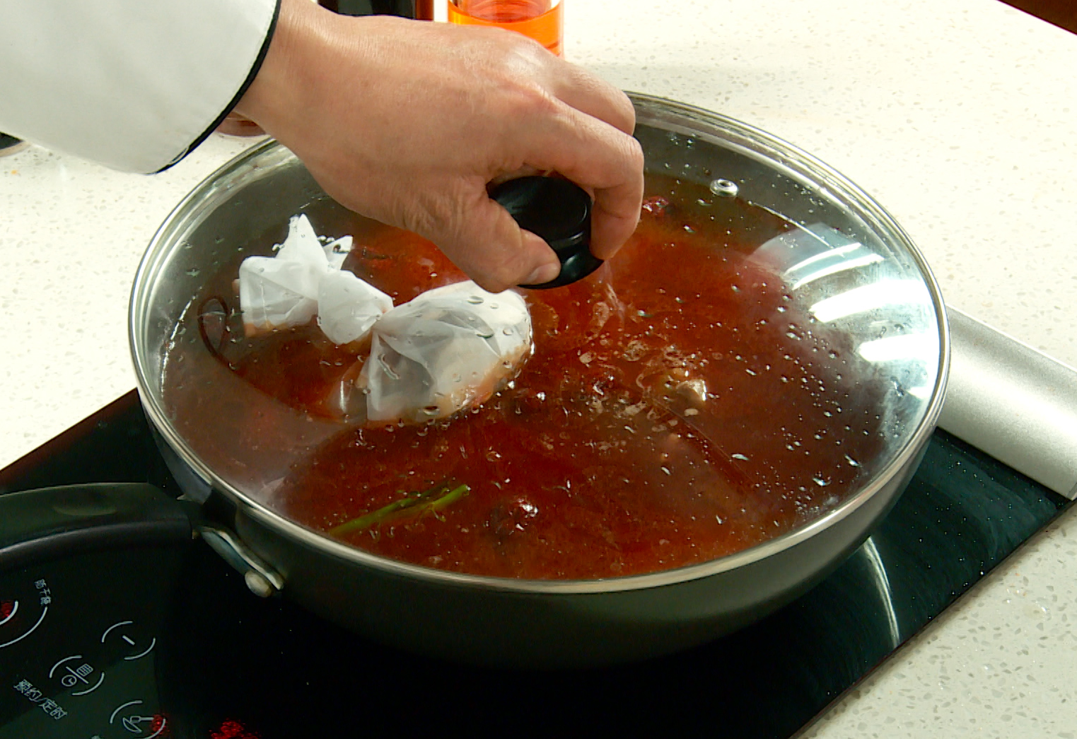 Cook broth by simmering ingredients and spice bag in water for 20 mins.