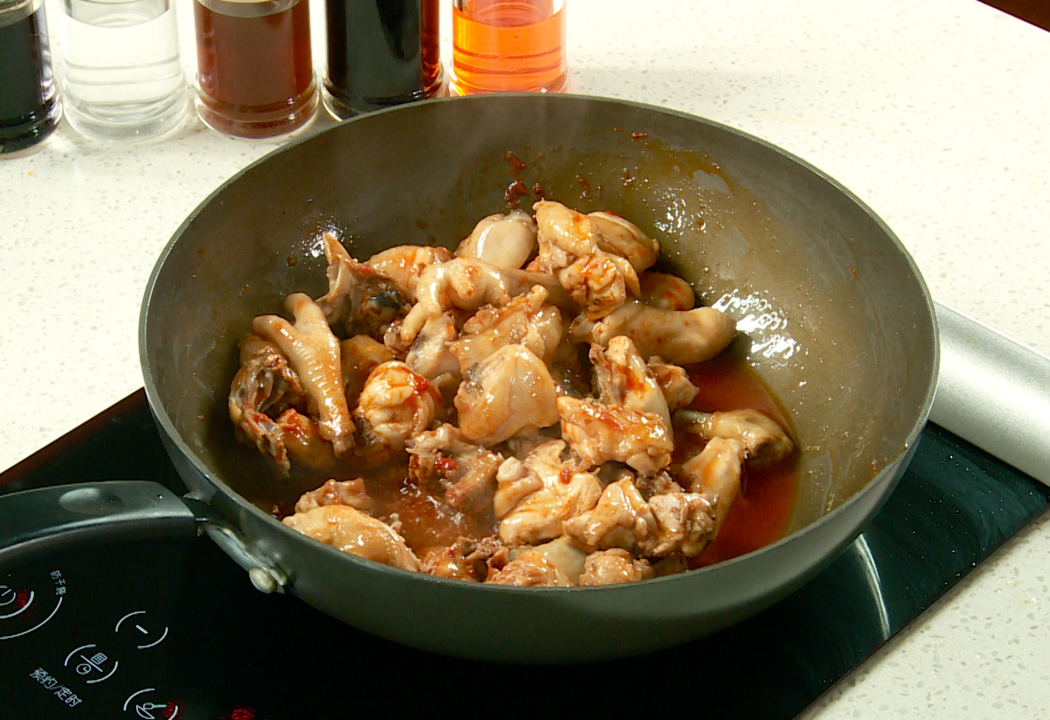 Seasoning and stir-frying instructions using cooking wine, soy sauce, chili sauce, and spare rib sauce.