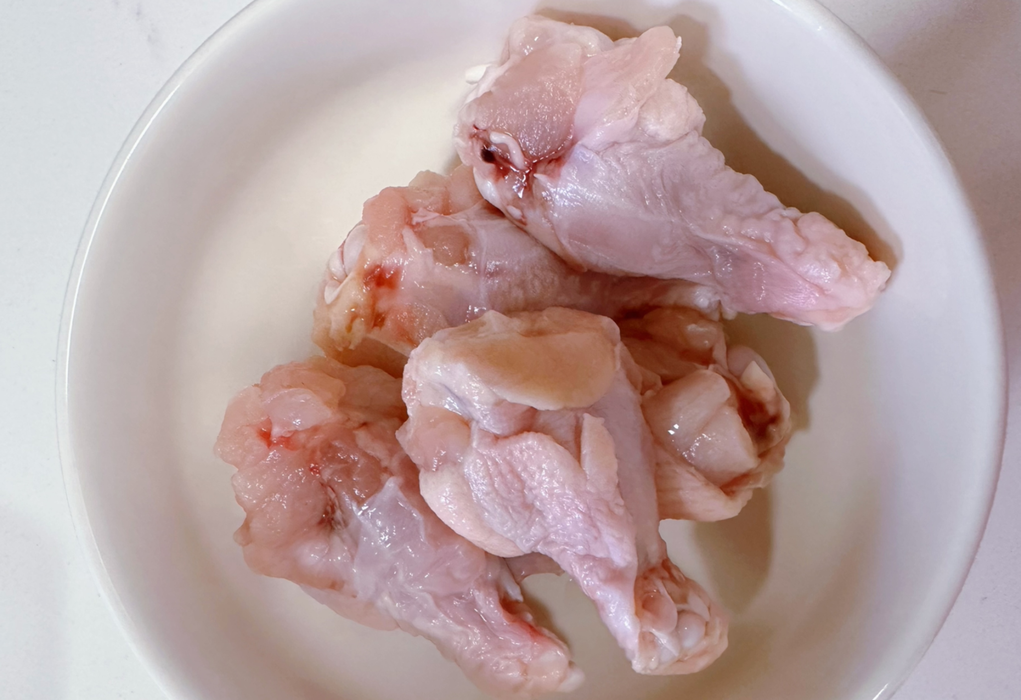 Thaw and prep small chicken wings for a delicious and tender result.