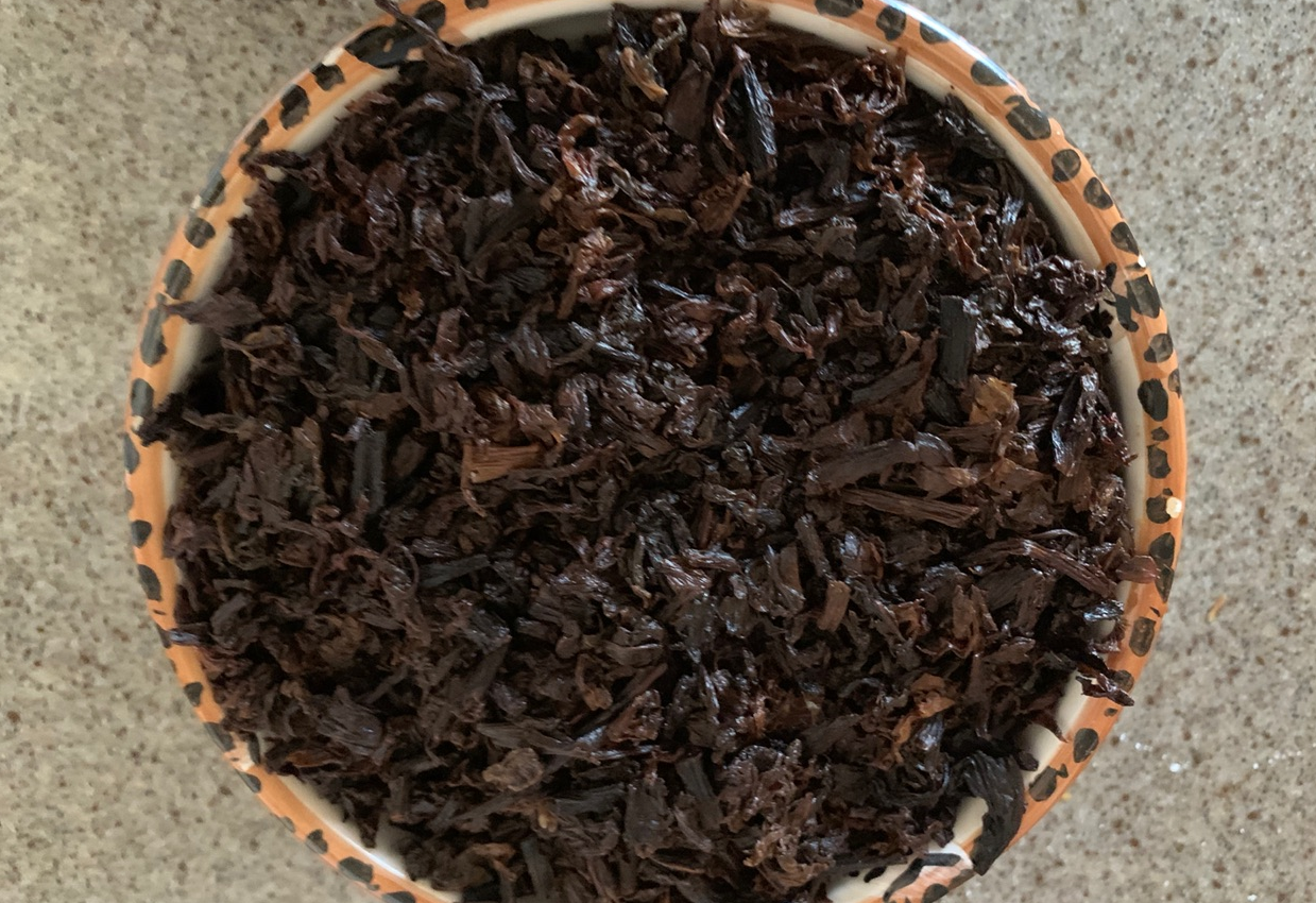 Level the preserved mustard greens with the bowl rim.