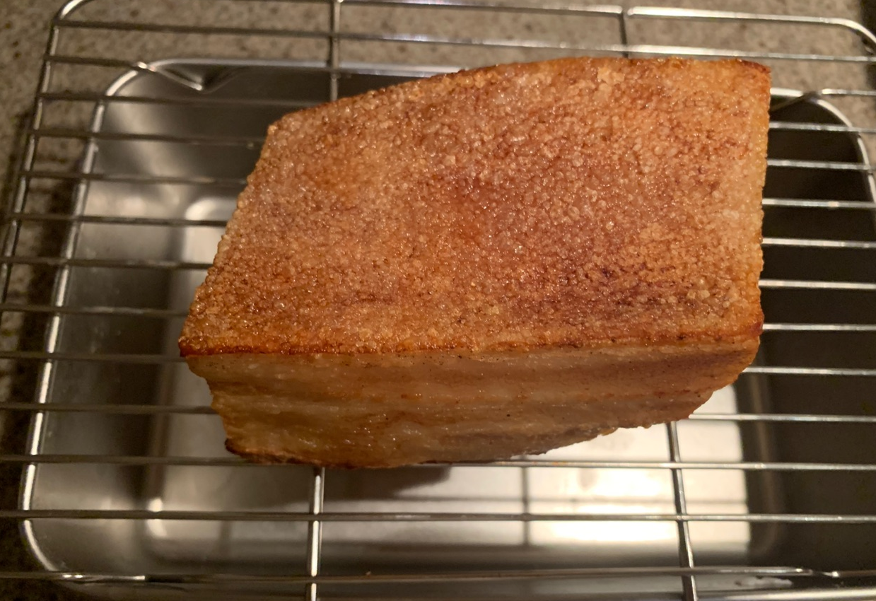 Fry pork belly to golden brown, cool on rack.