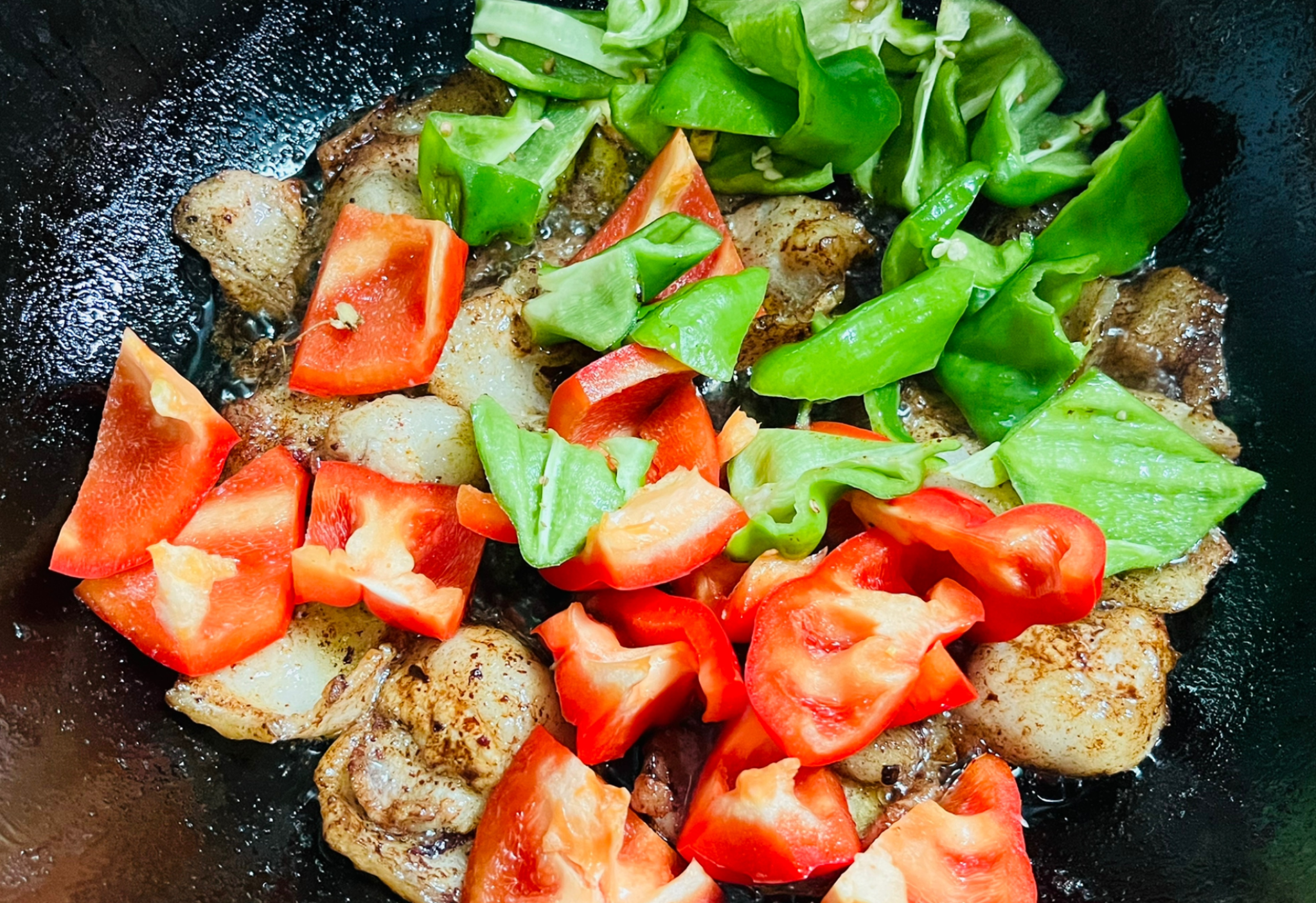 Stir-fry bell peppers with doubanjiang for added flavor.