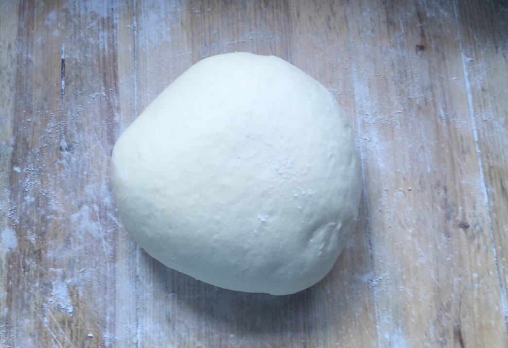 Kneading fermented dough restores original size; process known as punching down.