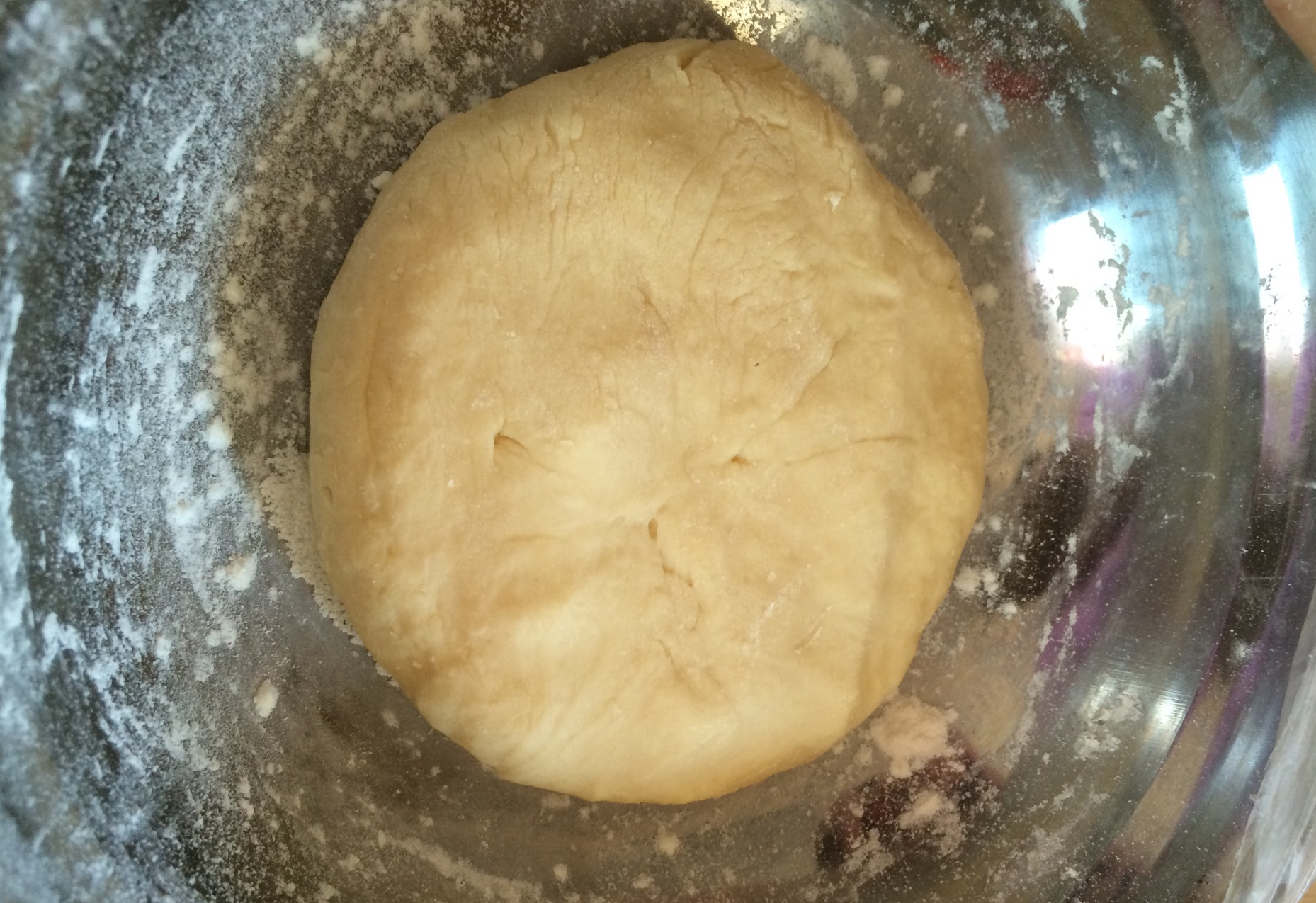 Ferment kneaded dough for 30 minutes until it rises and becomes smooth. Test fermentation by pressing dough.