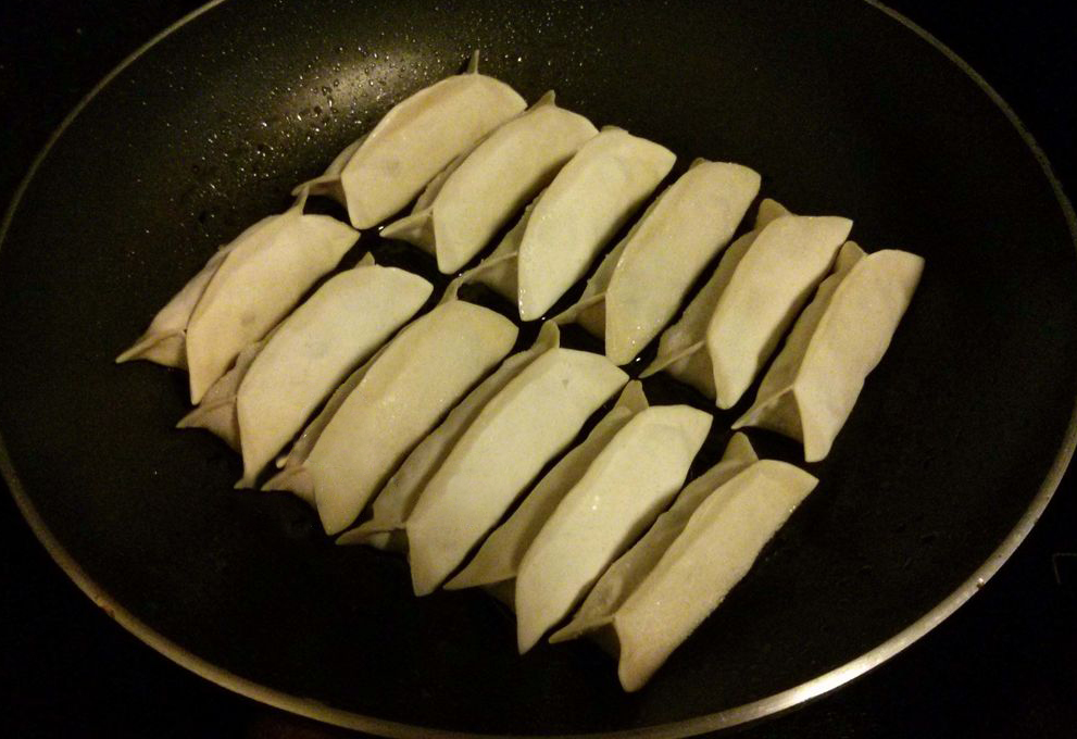 Instructions for water-frying potstickers: Heat oil, fry wrappers until golden brown.