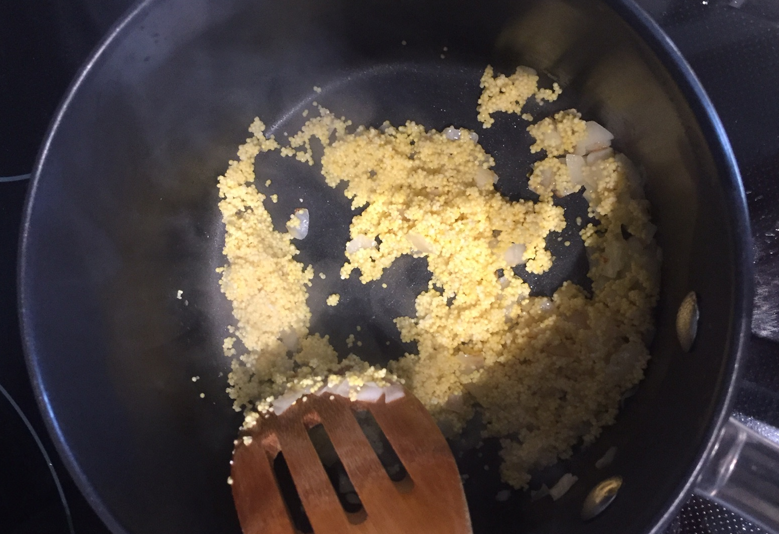 Add millet, stir-fry for 3 min until fragrant on medium-low heat. Use caution with heat.