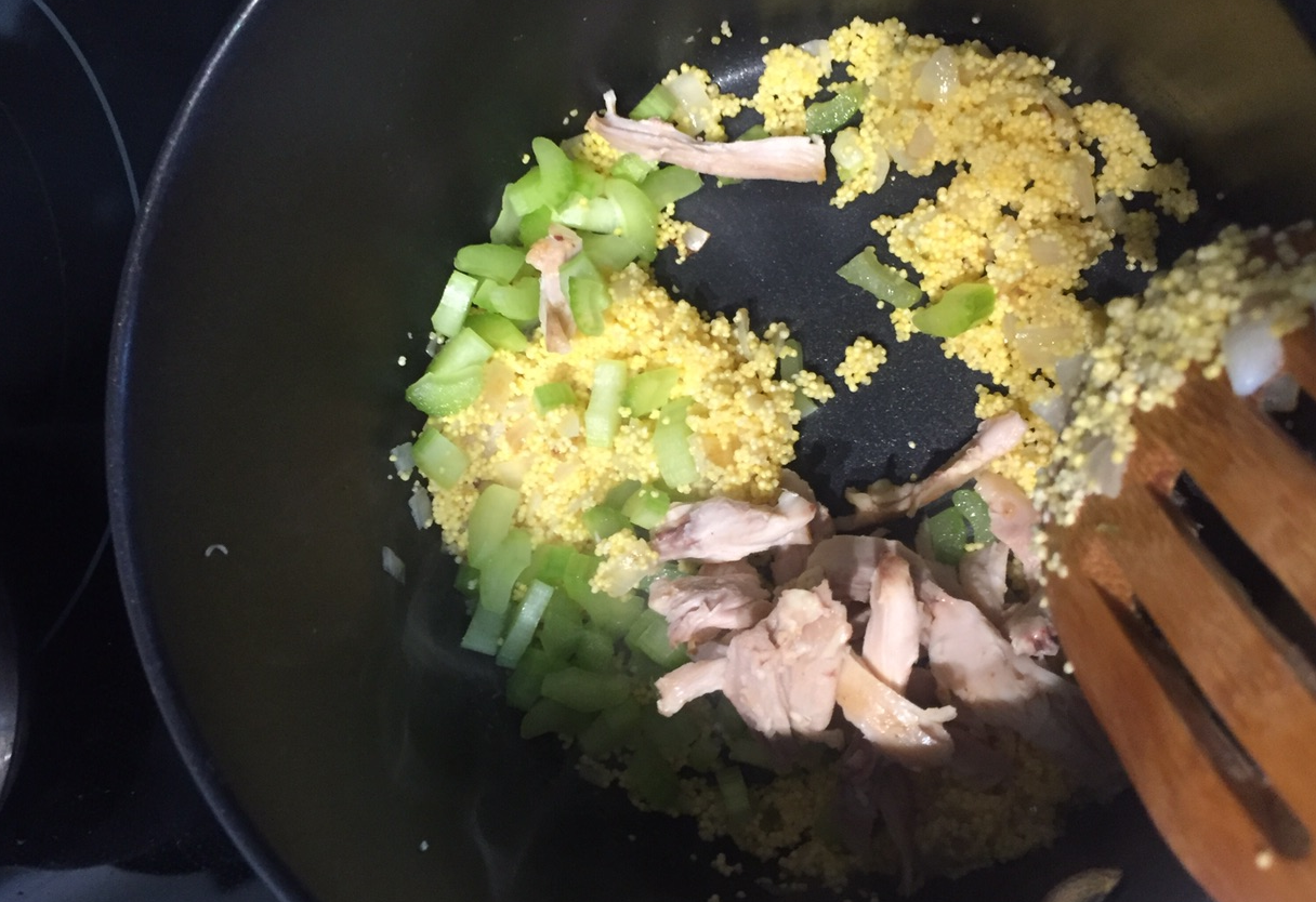 Add minced celery and shredded chicken breast. Hold off on adding cooked carrots and green peas.