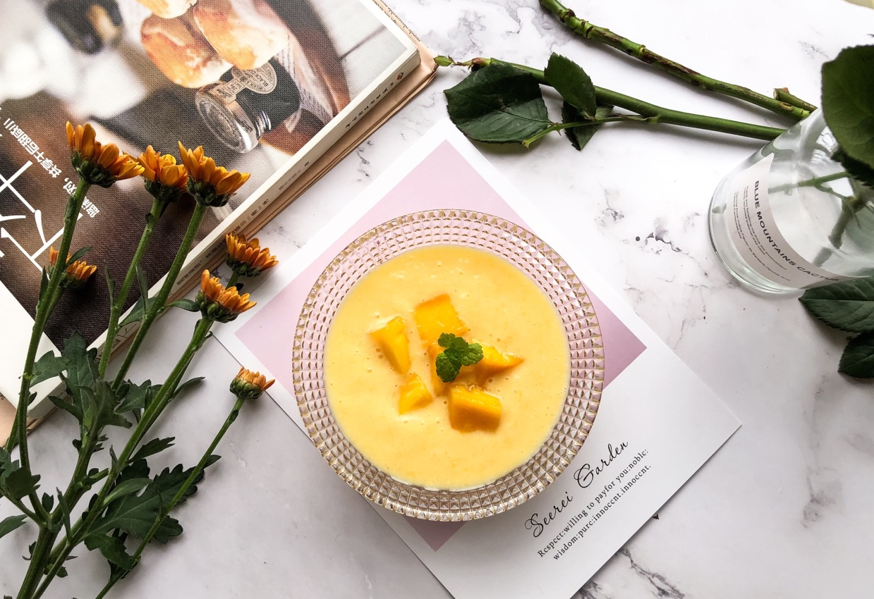 Make a delicious mango sago dessert by layering ingredients in a bowl. Chill for a refreshing treat.