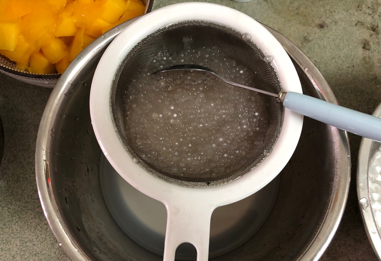 Rinse cooked sago pearls for smoother texture and to stop cooking.