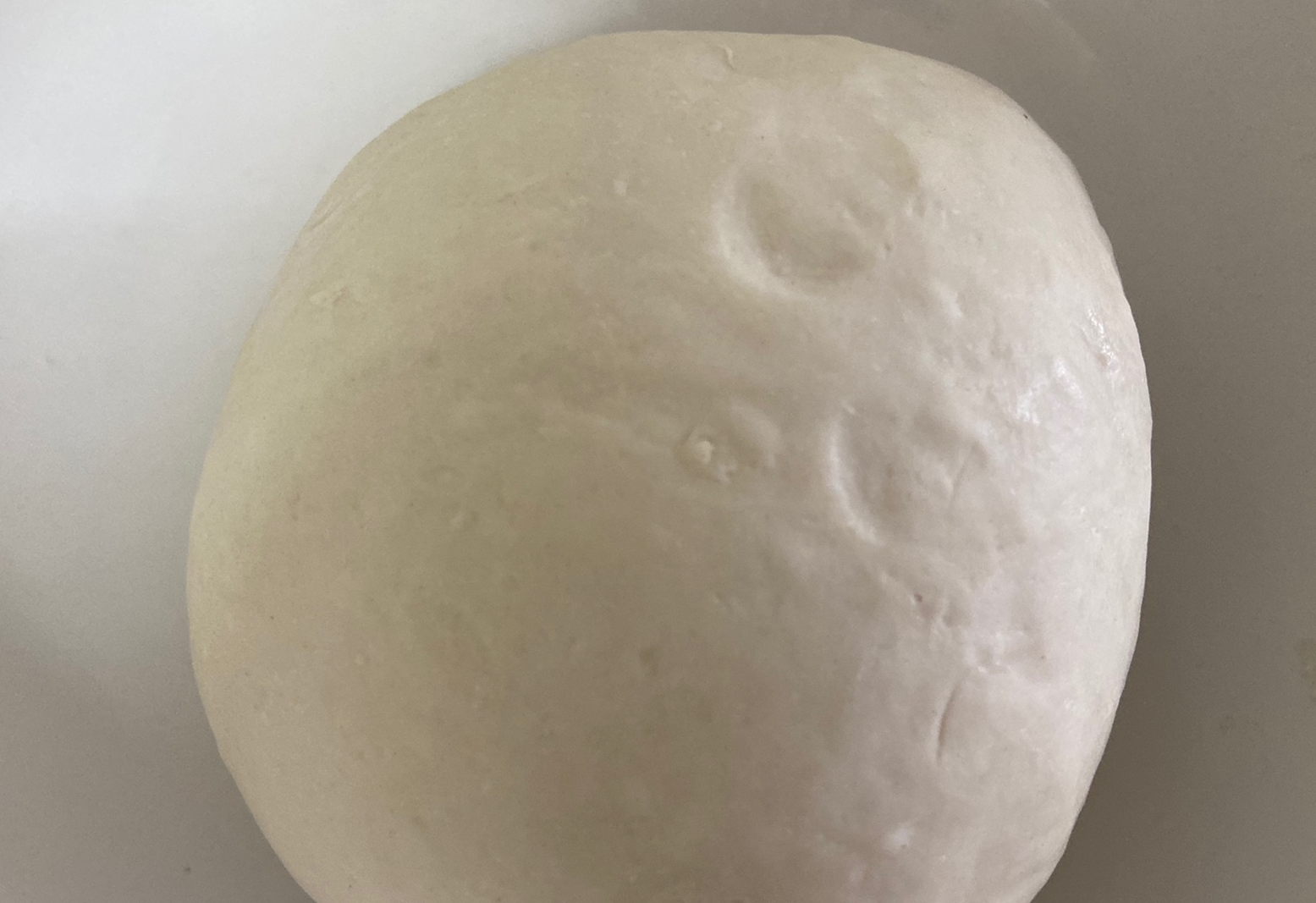 Instructions to knead flour into a smooth dough.