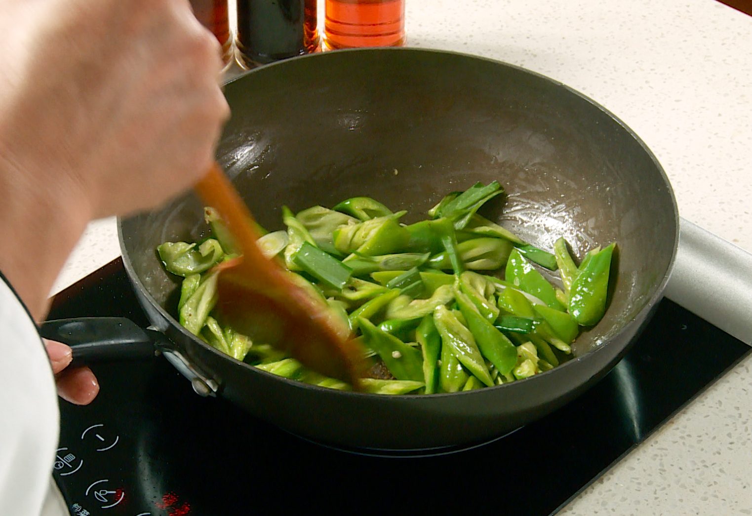 Season vegetables with 1 teaspoon of salt while stir-frying evenly.