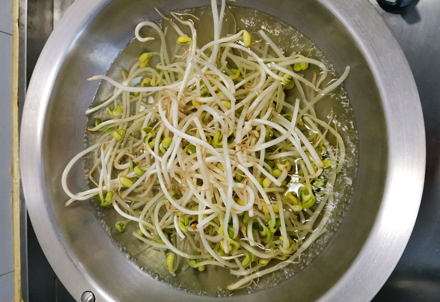 Blanch soybean sprouts for 2 min, rinse under cold water to preserve crunchiness.