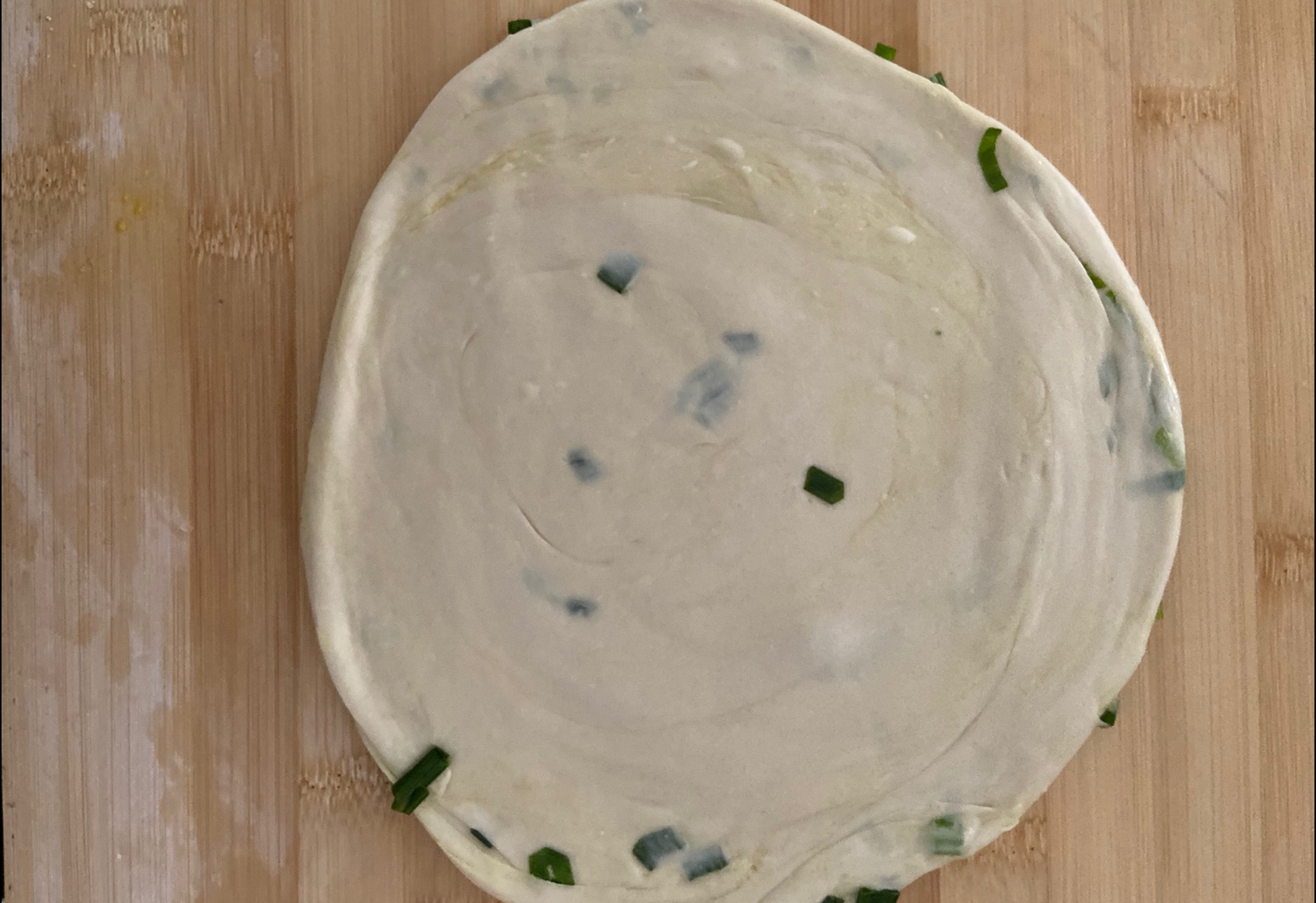 Shape rested dough into a circle.