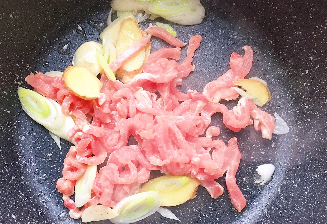 Combine shredded meat with stir-fry ingredients.