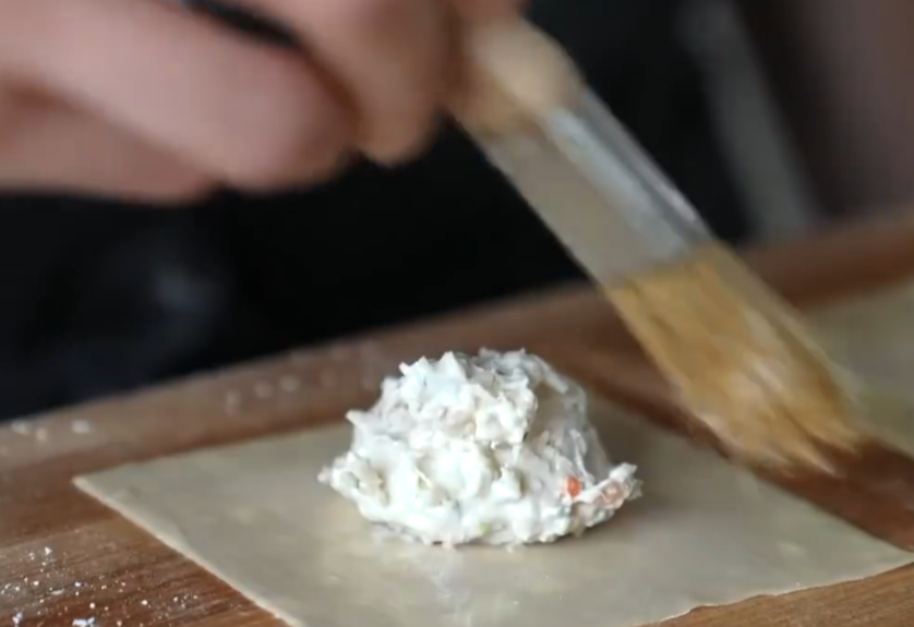 Tip: Brushing wonton wrapper edges with egg aids in sealing.