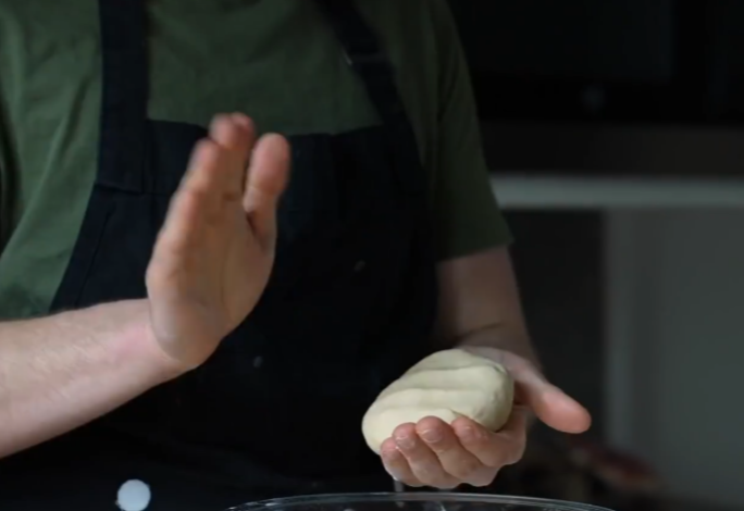 Knead dough by hand until smooth and soft, takes 1-2 minutes.