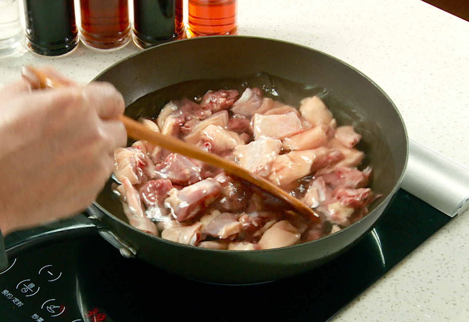 Blanch the duck by boiling in water to remove blood, then drain.