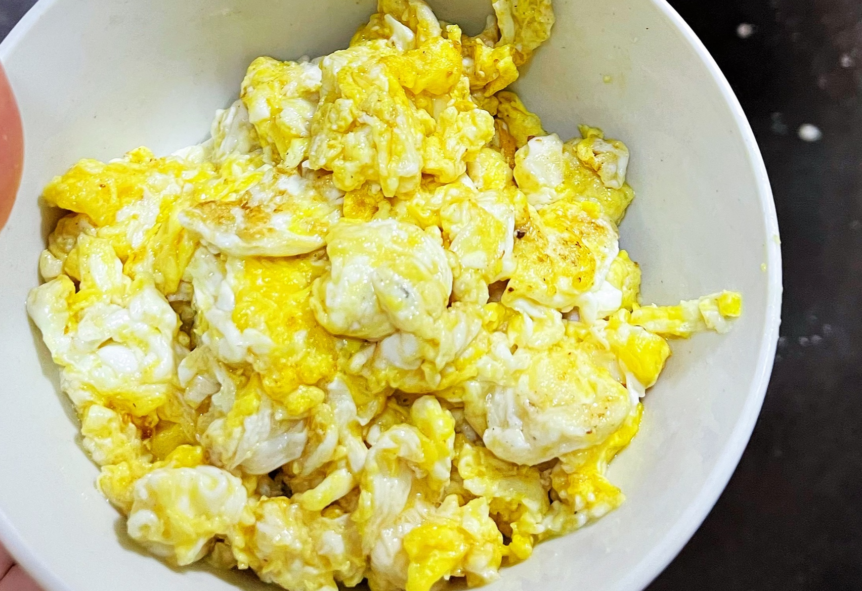 Beat two eggs with salt, scramble until cooked, set aside.