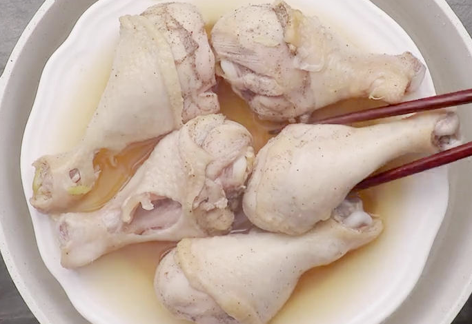 Marinate, steam chicken legs for 20 minutes; dry skin before browning.