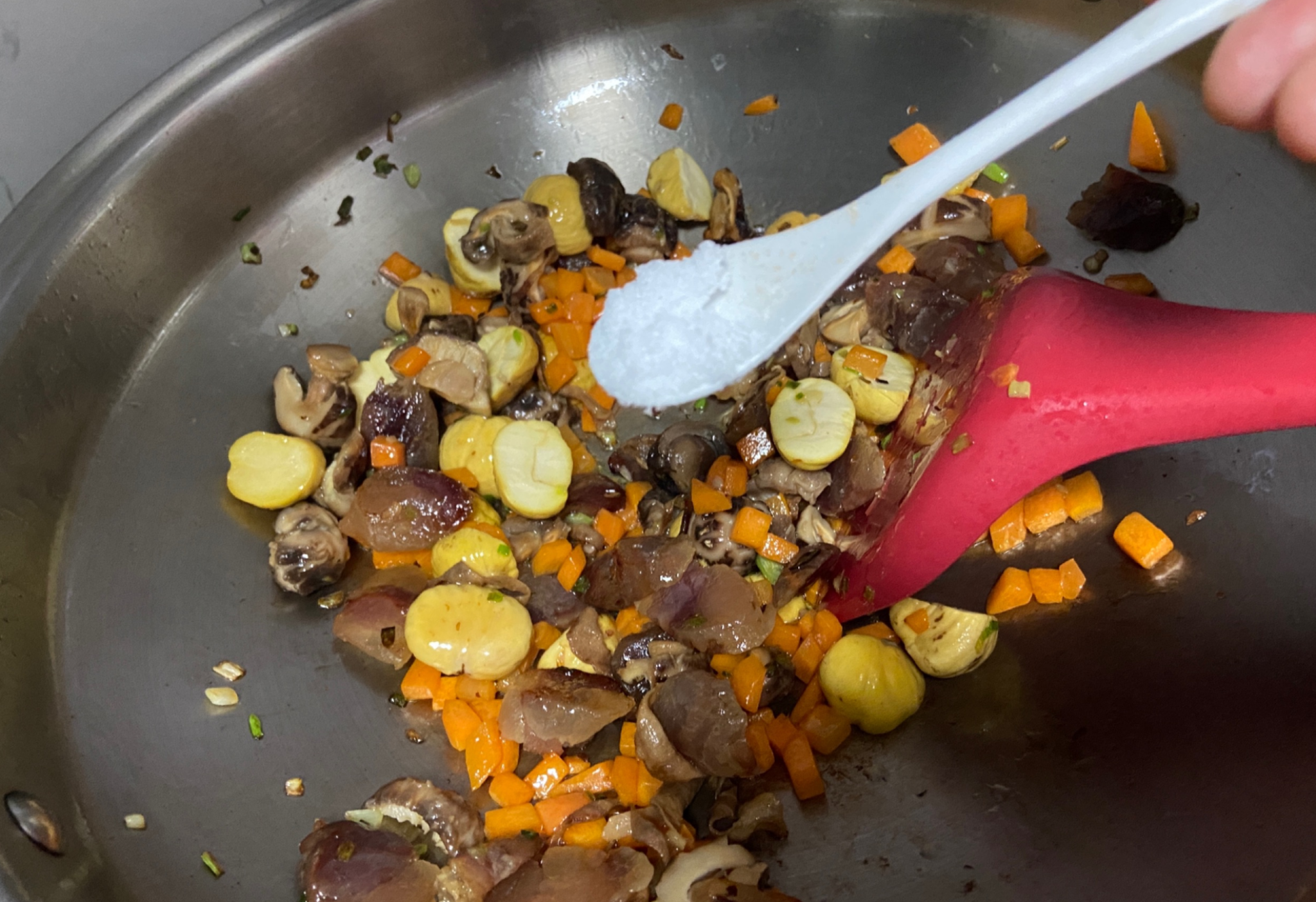 Season chestnuts and mushrooms with salt for flavor.