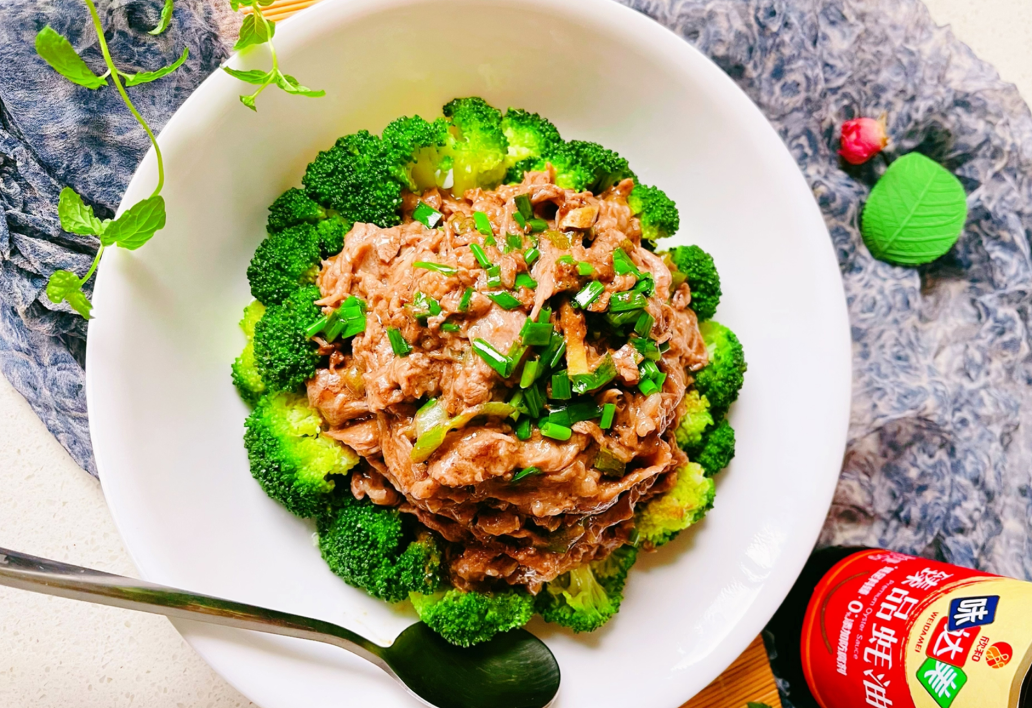 Top broccoli with beef slices on a serving plate; for more flavor, stir-fry them together.