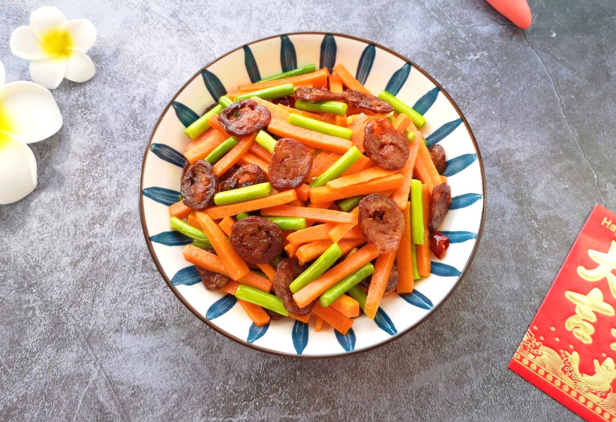 Delicious Carrot Stir-Fry with Chinese Sausage is ready to eat.