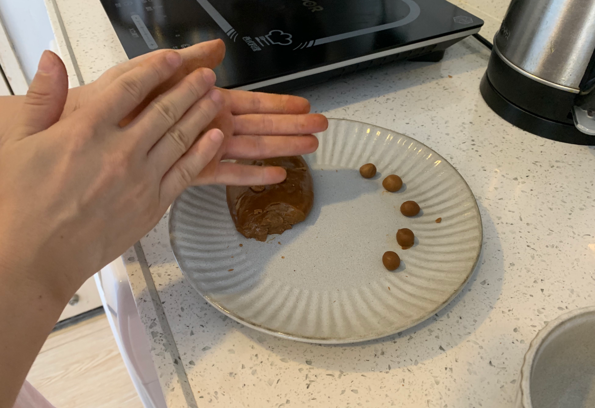 Roll mixture into small balls by hand.