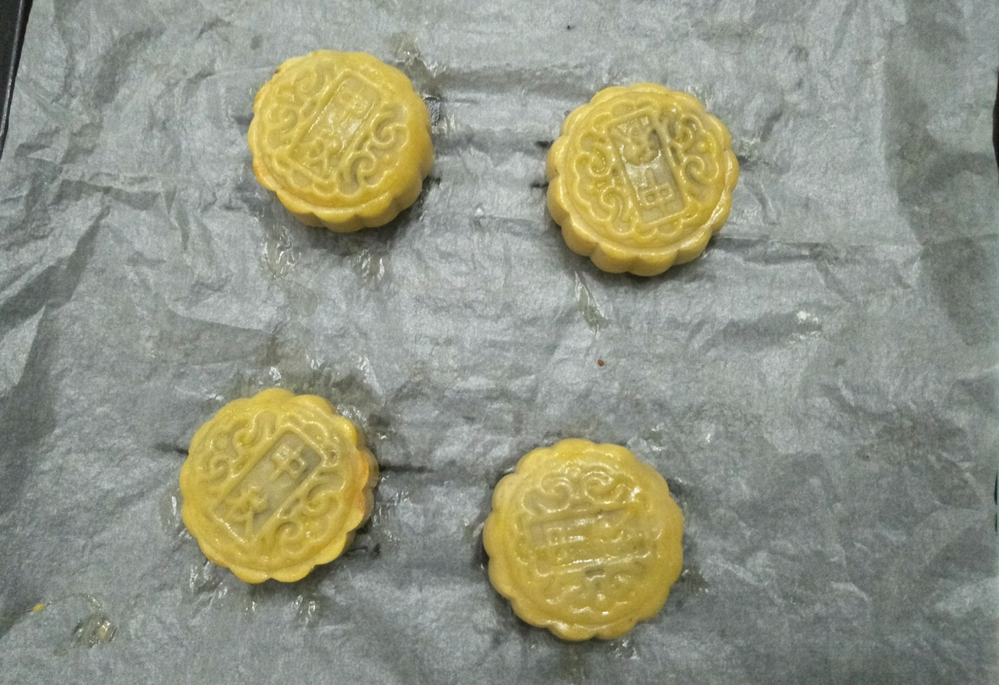 Brush shaped mooncakes with egg wash for color.