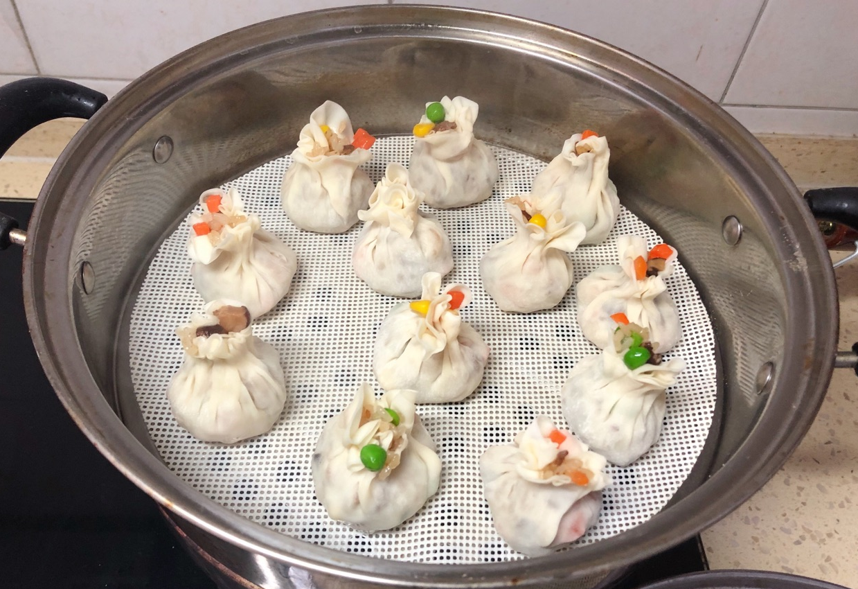 Make 25 shrimp shumai, line steamer with cloth to prevent sticking and maintain texture.