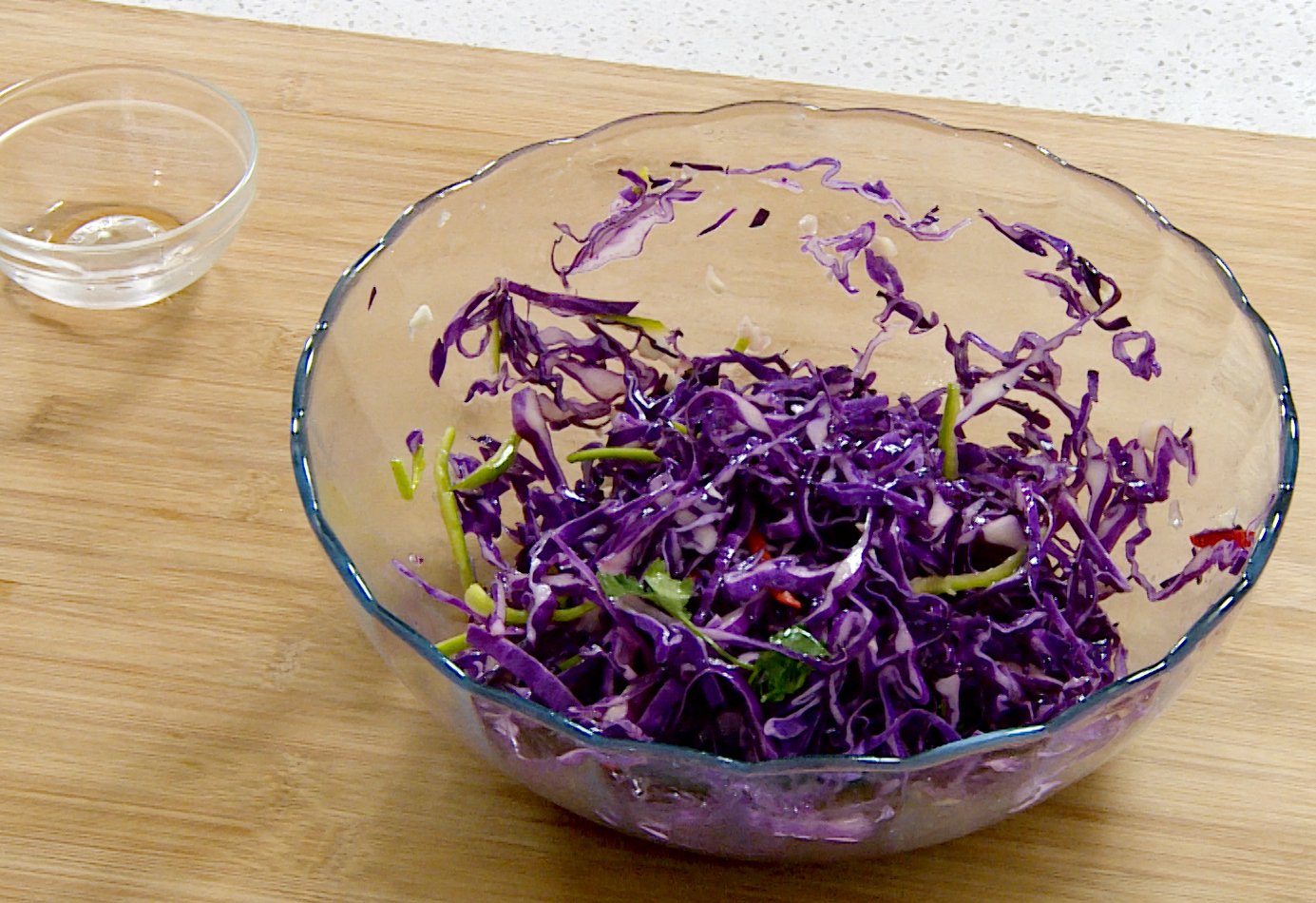 Recipe for a colorful and flavorful cabbage salad with bell peppers and Sichuan peppercorn oil.