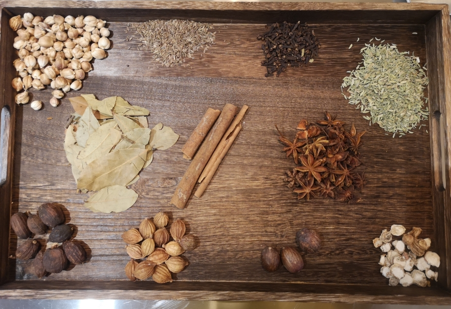 Blend cardamom, thyme, cloves, bay leaves, fennel seeds, cinnamon, star anise, Sichuan peppercorns, lesser galangal, amomum fruit, and Amomum tsao-ko. Mix in white wine for aroma.