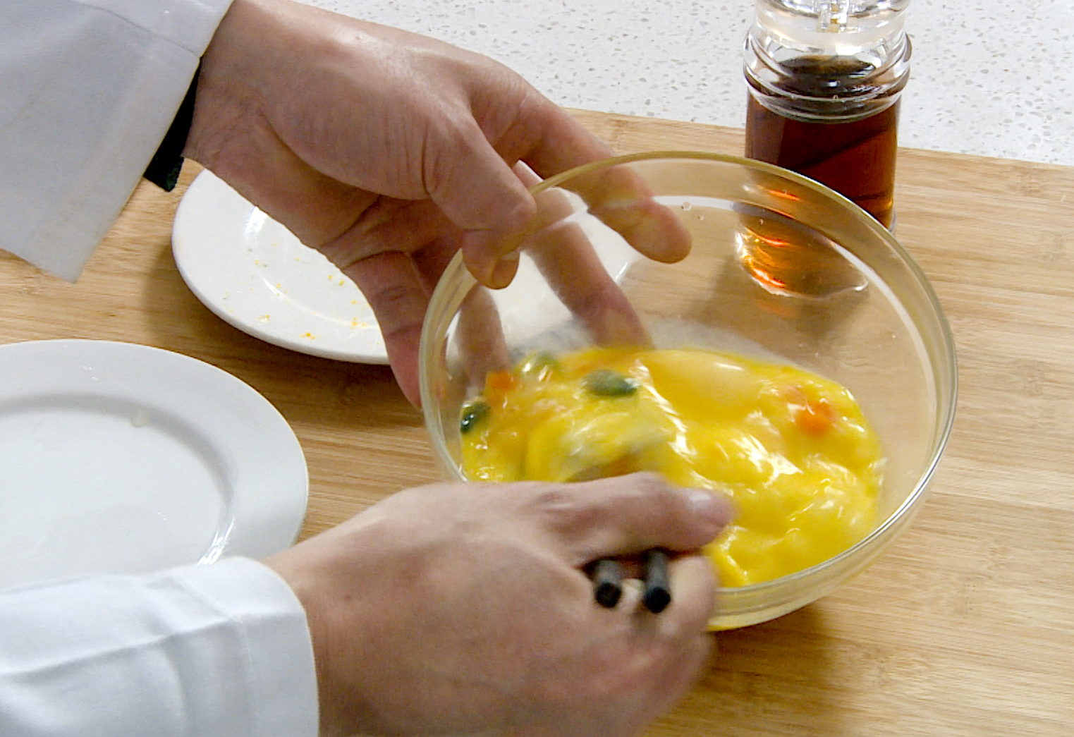 Mix eggs with salt, cooking wine, water, century egg, and salted egg yolks, beat well.