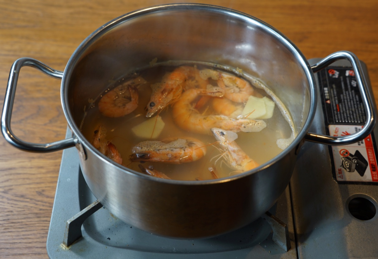 Cook and peel shrimp, then remove the vein using a toothpick.