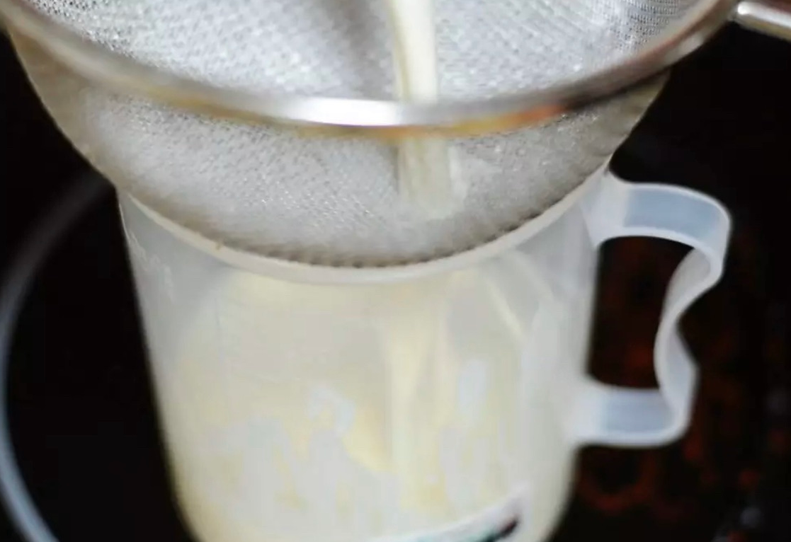 Tip to ensure smooth Panna Cotta: Strain mixture through a fine sieve.