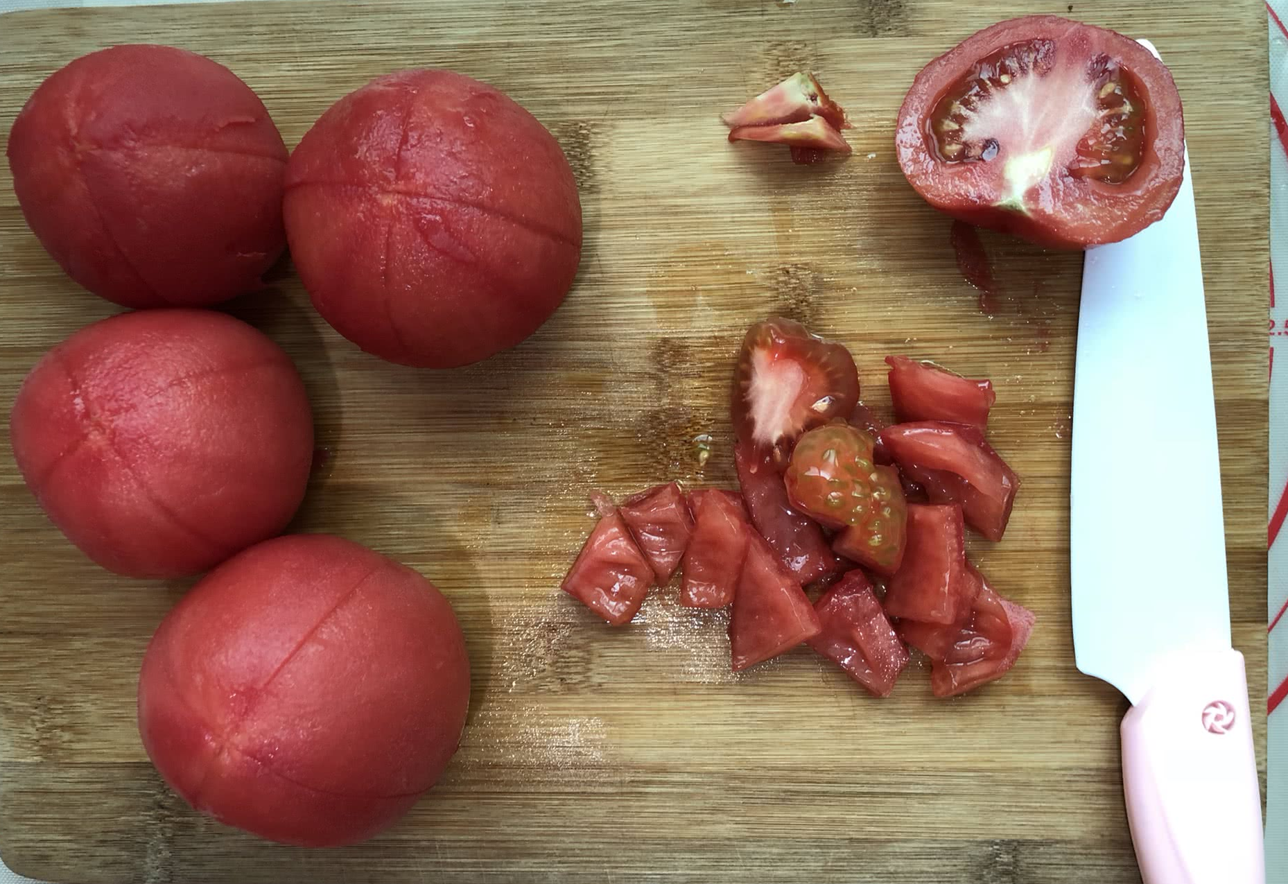 Instructions: Dice peeled tomatoes as illustrated in the image.