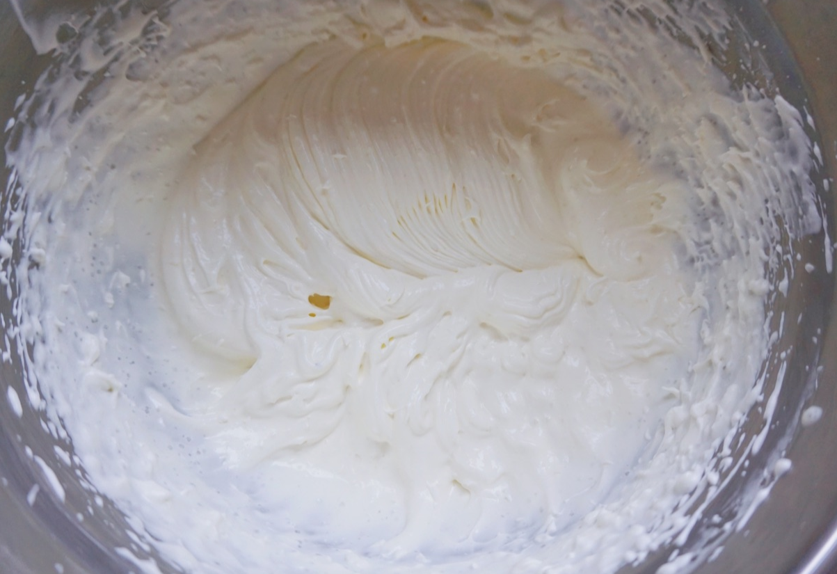 Beat heavy cream until stiff peaks form; use a fast and steady hand.