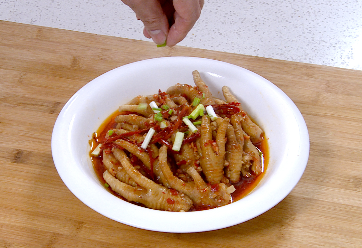 Recipe instruction to garnish with green onions before serving.