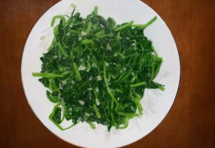 Crispy, tender garlic stir-fried pea shoots - ready to enjoy!