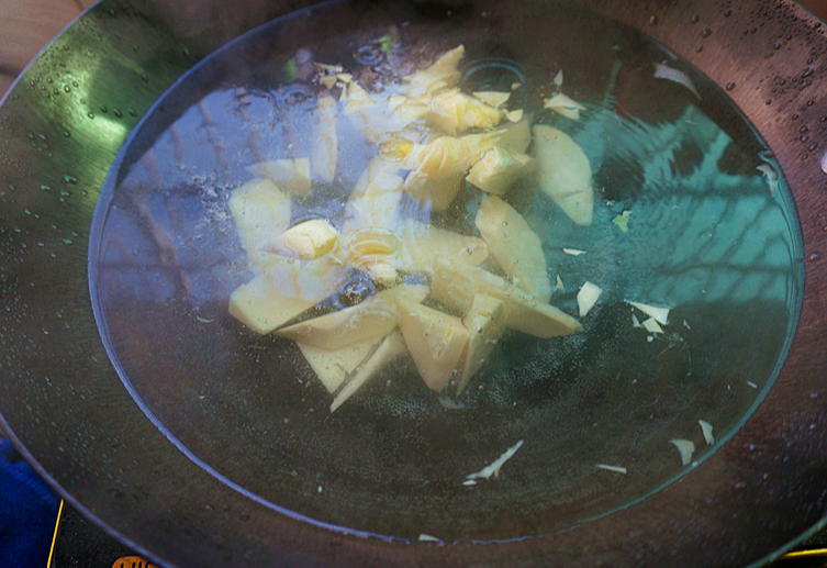 Boil cut bamboo shoots to reduce bitterness.